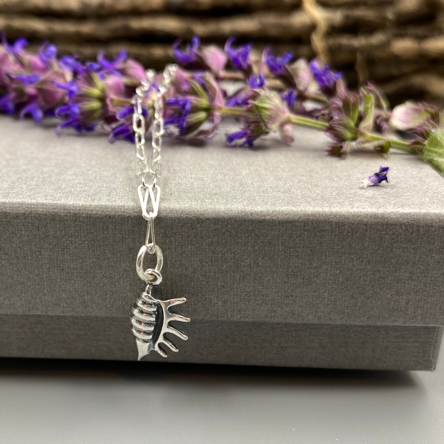 Conch charm skinny trace chain necklace in Sterling Silver