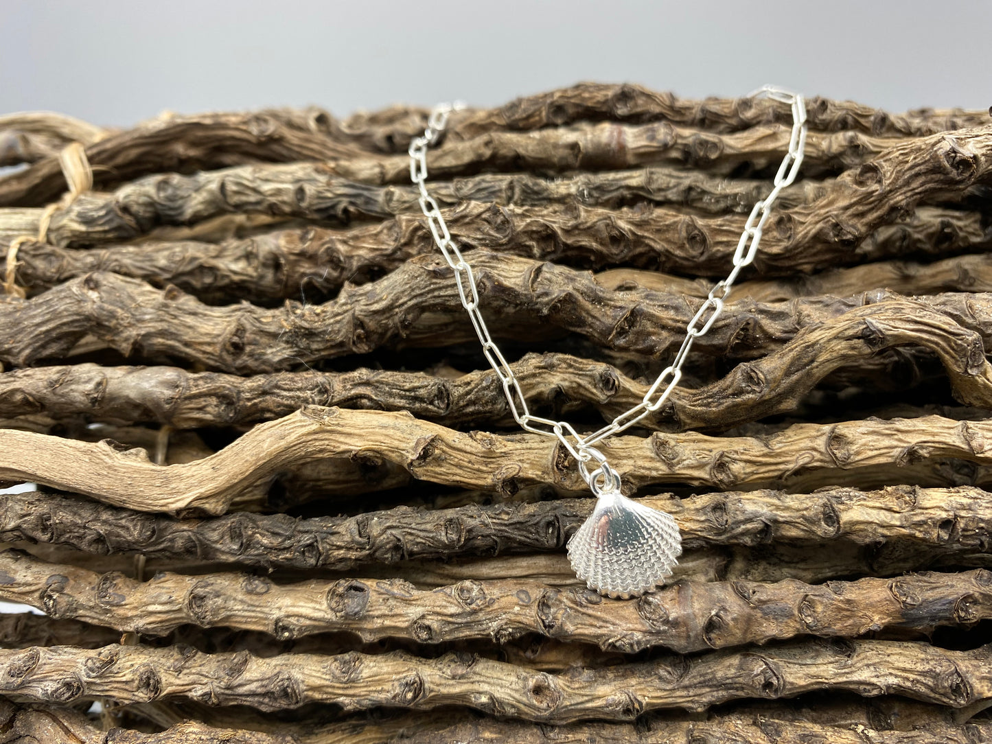 Sterling silver scallop charm skinny trace chain bracelet
