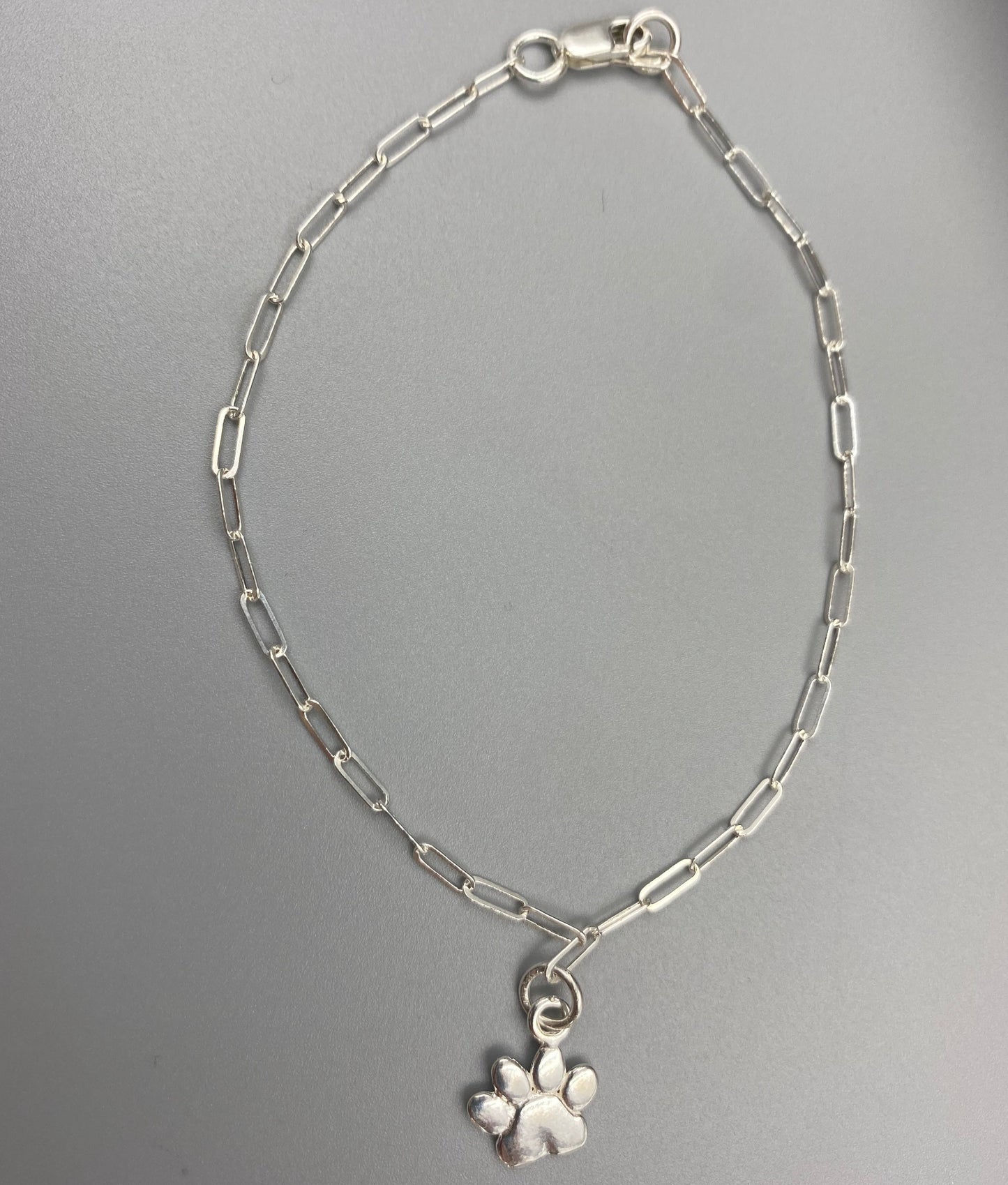 Sterling silver dog paw charm skinny trace chain bracelet