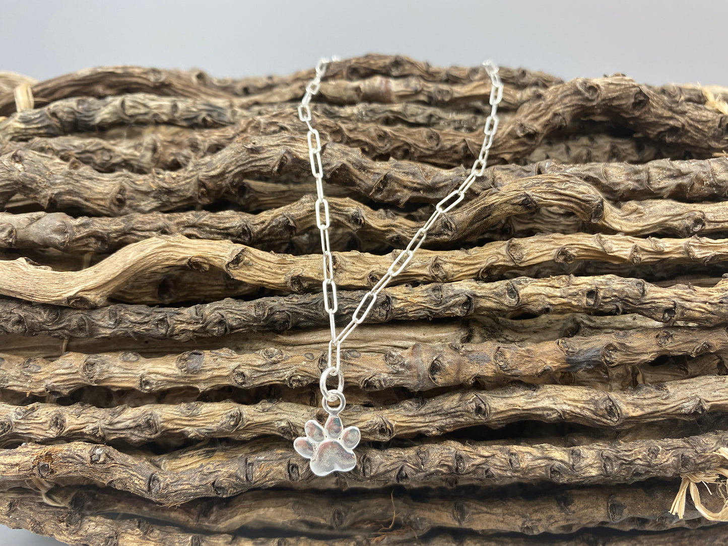 Sterling silver dog paw charm skinny trace chain bracelet