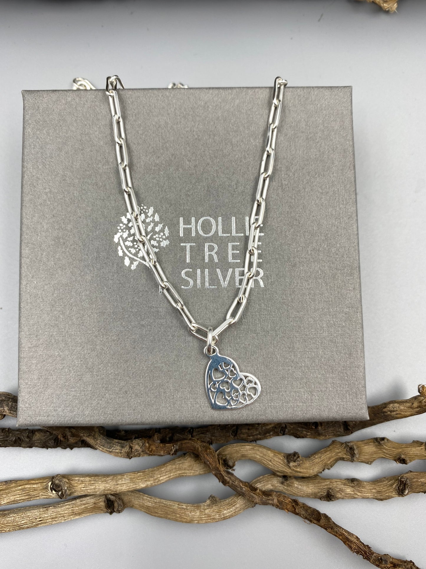 Hearts in a heart charm trace chain necklace in Sterling Silver