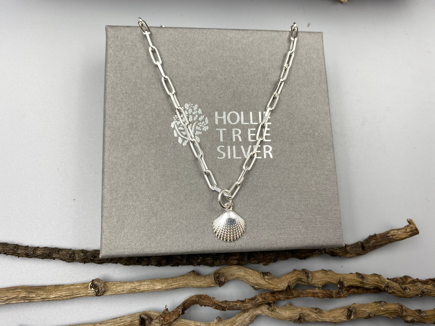 Scallop charm trace chain necklace in Sterling Silver