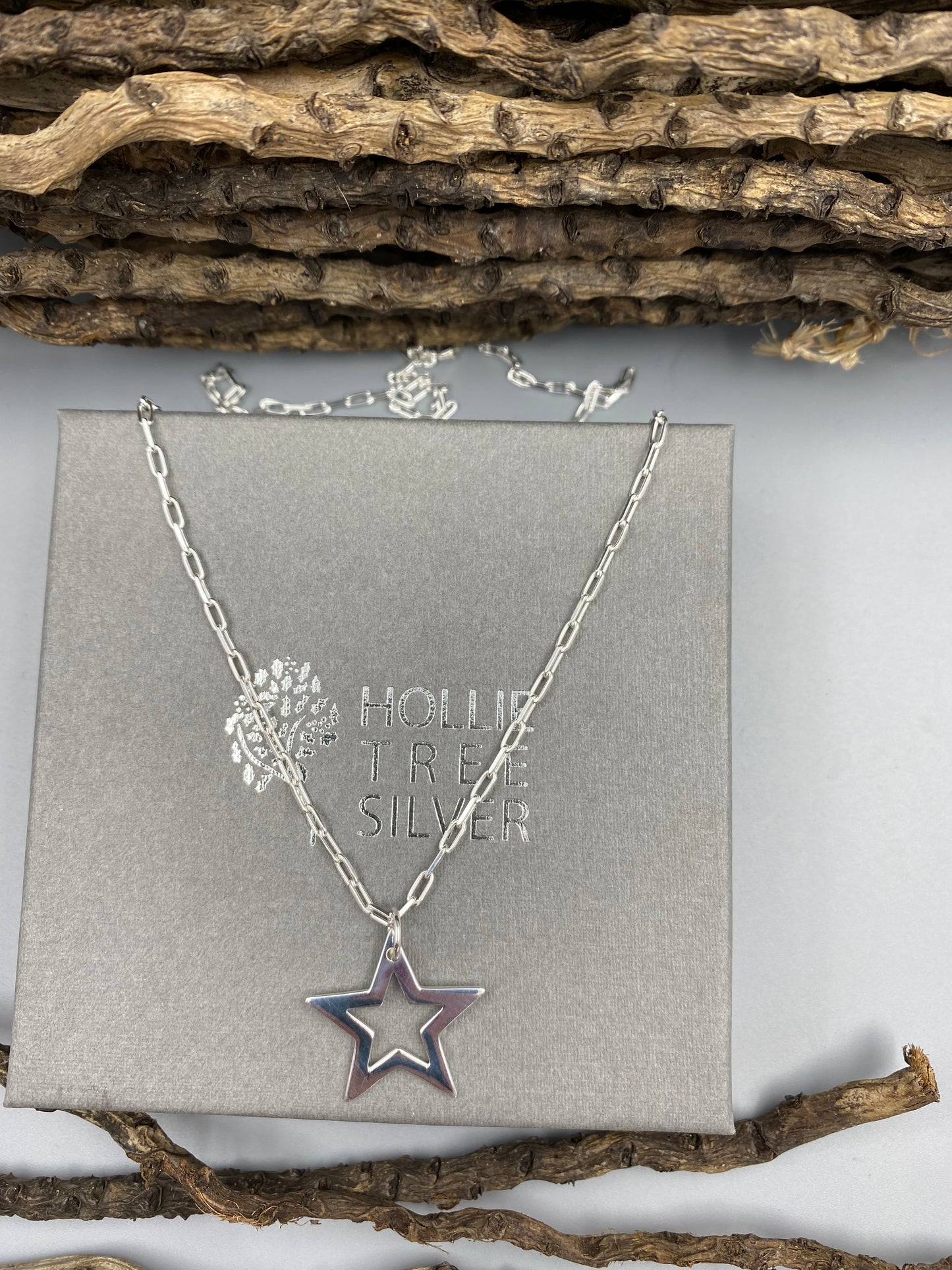Open star charm skinny trace chain necklace in Sterling Silver