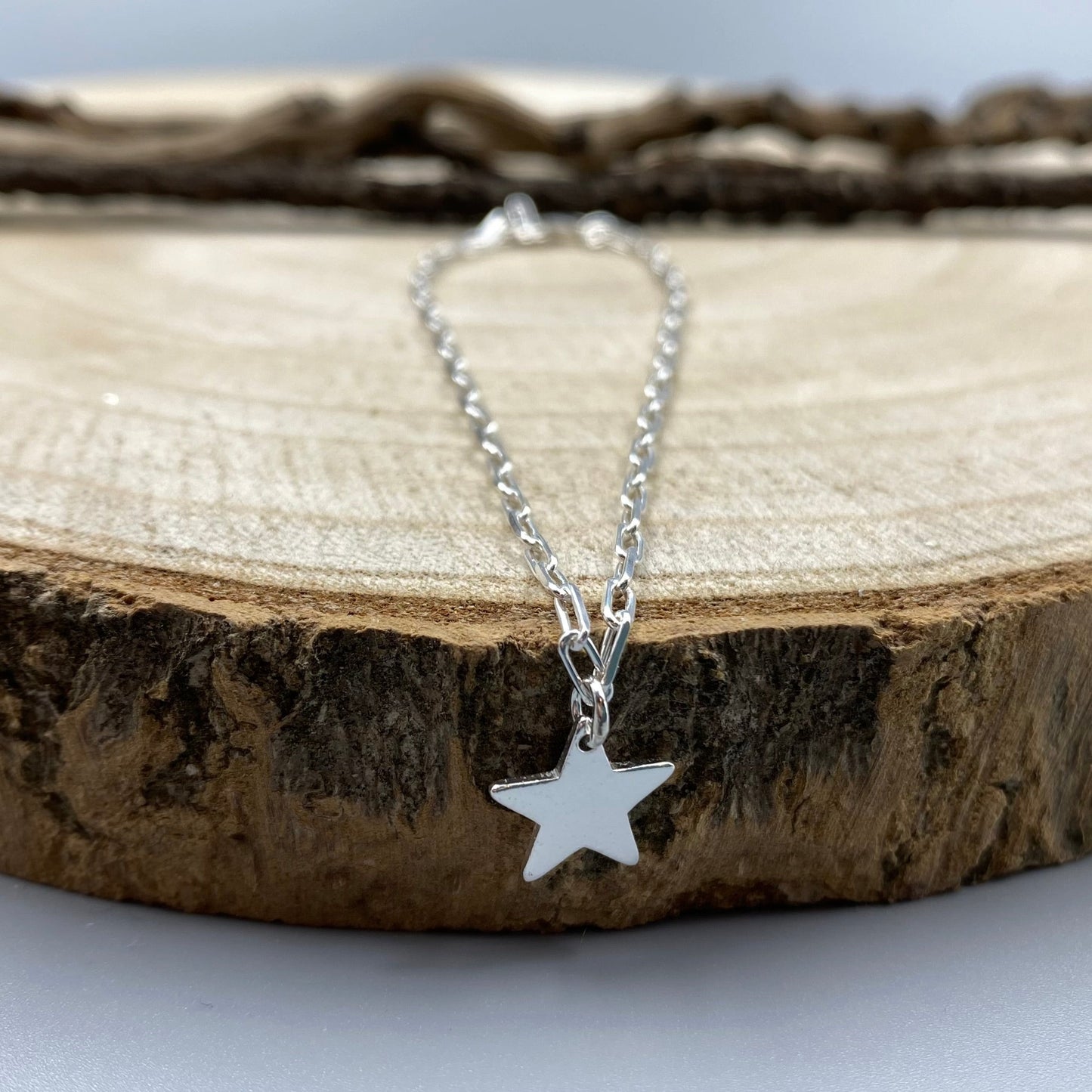 Sterling silver star charm skinny trace chain bracelet