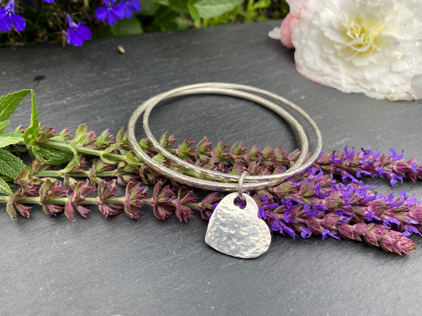 Sterling silver dimple texture double bangle with a heart charm