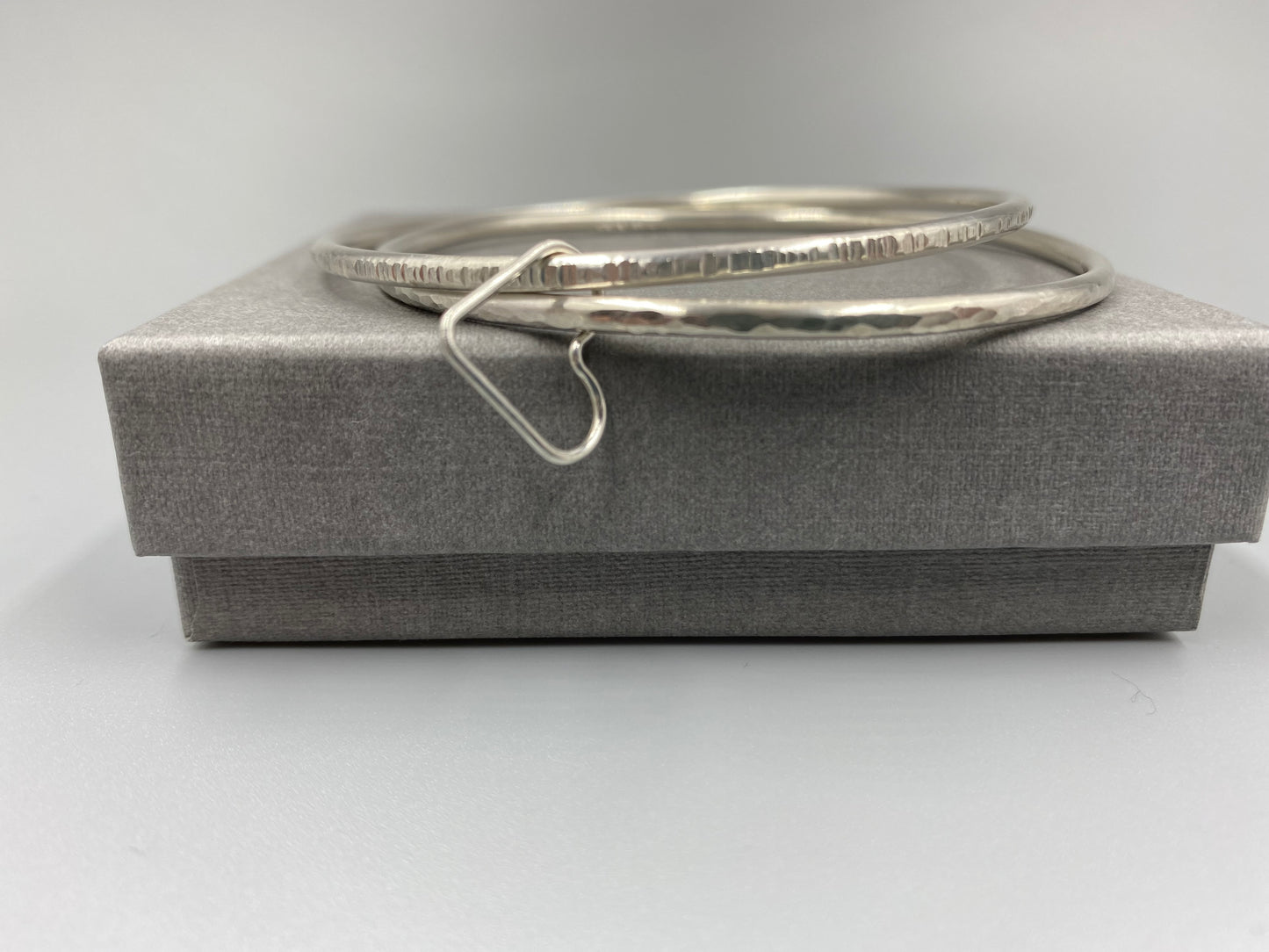 Sterling silver double texture stacker bangle with open heart ring
