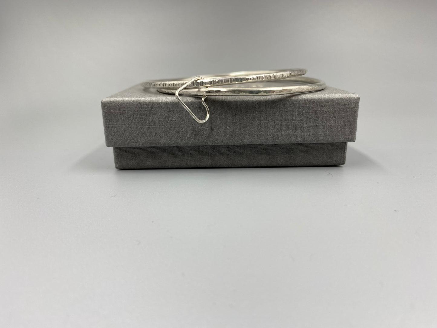 Sterling silver double texture stacker bangle with open heart ring