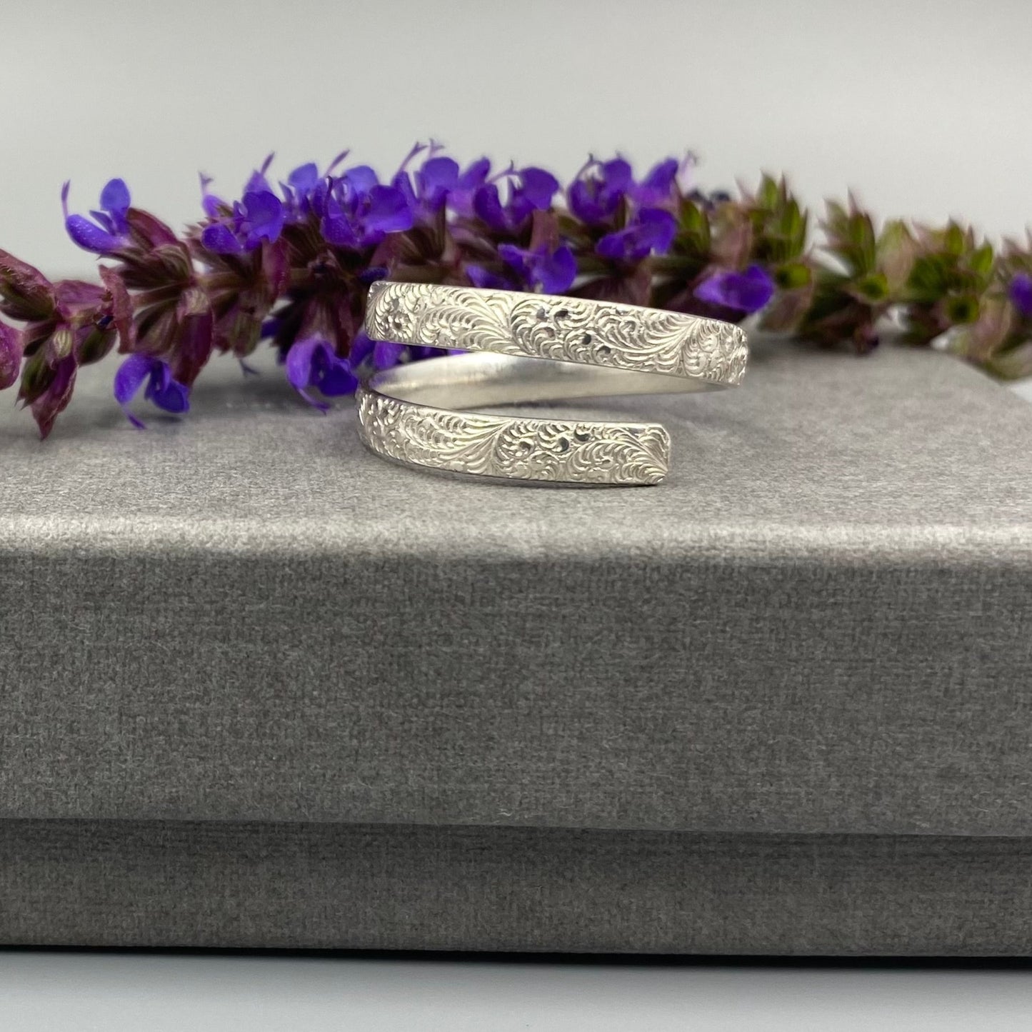 Sterling silver floral pattern wrap ring