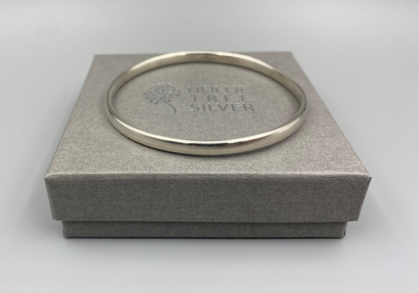 Sterling silver polished oval bangle