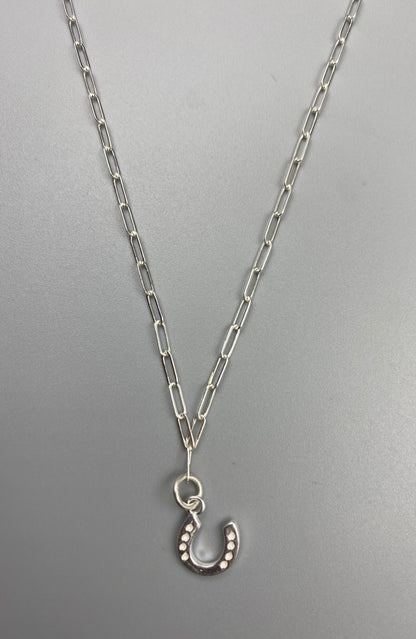 Horseshoe charm skinny trace chain necklace in Sterling Silver