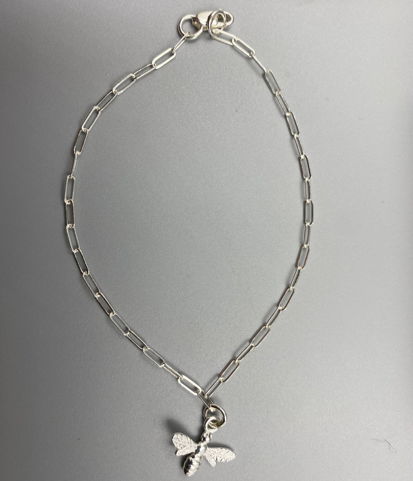 Sterling silver bee charm skinny trace chain bracelet