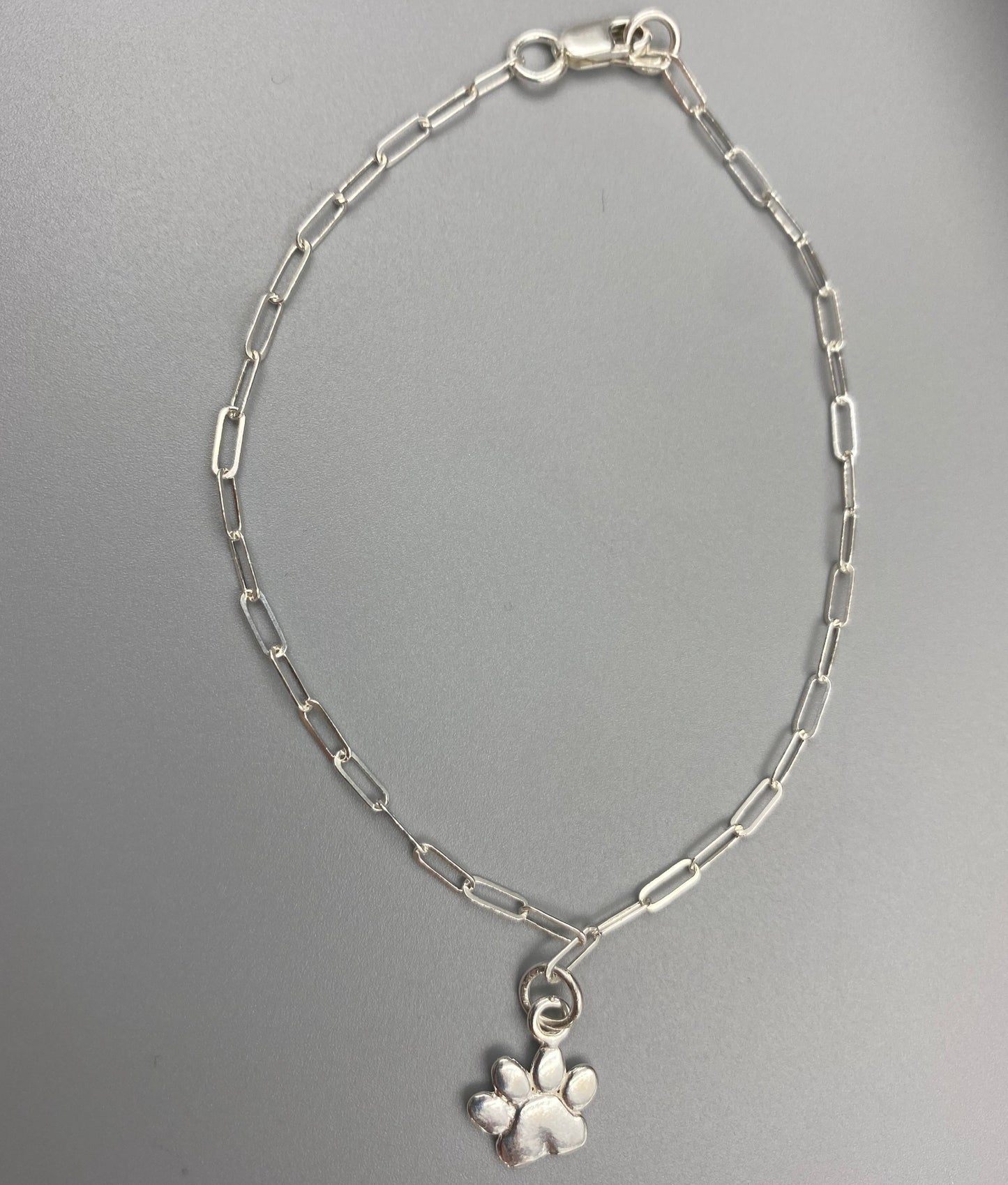Sterling silver dog paw charm skinny trace chain bracelet