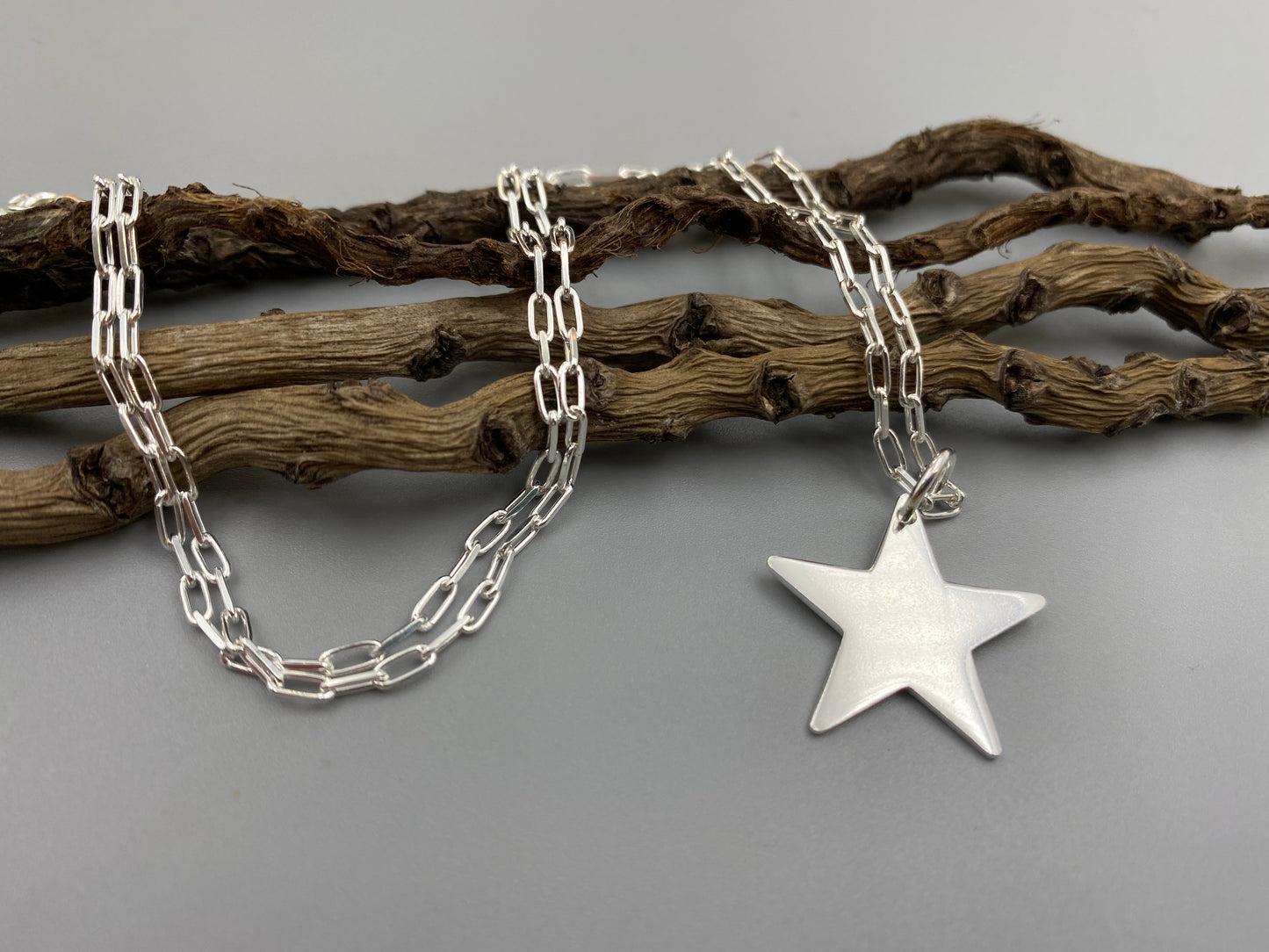 Star charm skinny trace chain necklace in Sterling Silver