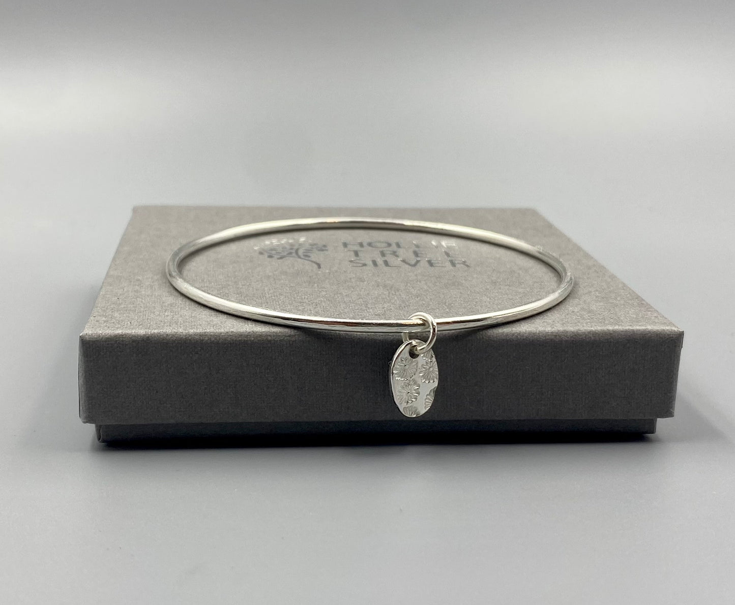 Daisy disc bangle in Sterling Silver - April Birthday