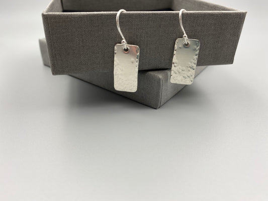 Sterling silver part dimple textured earrings
