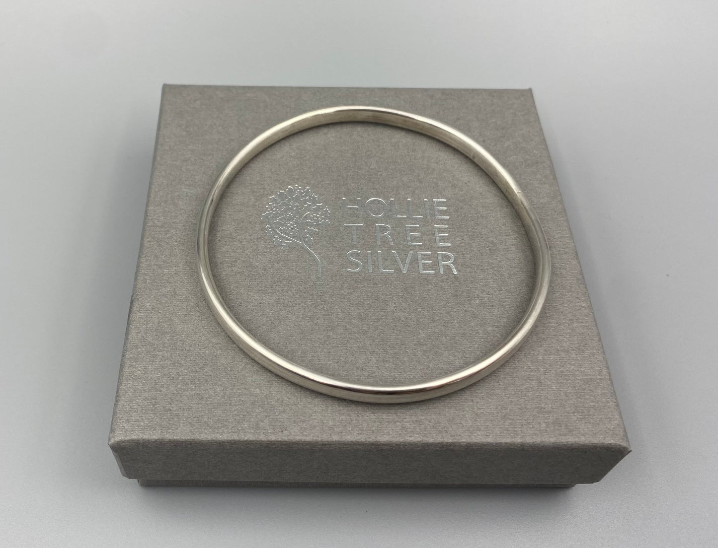 Sterling silver polished oval bangle