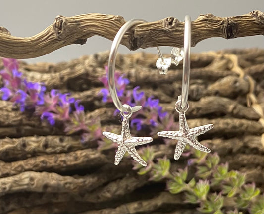 Half hoop earrings with our starfish charm in Sterling Silver